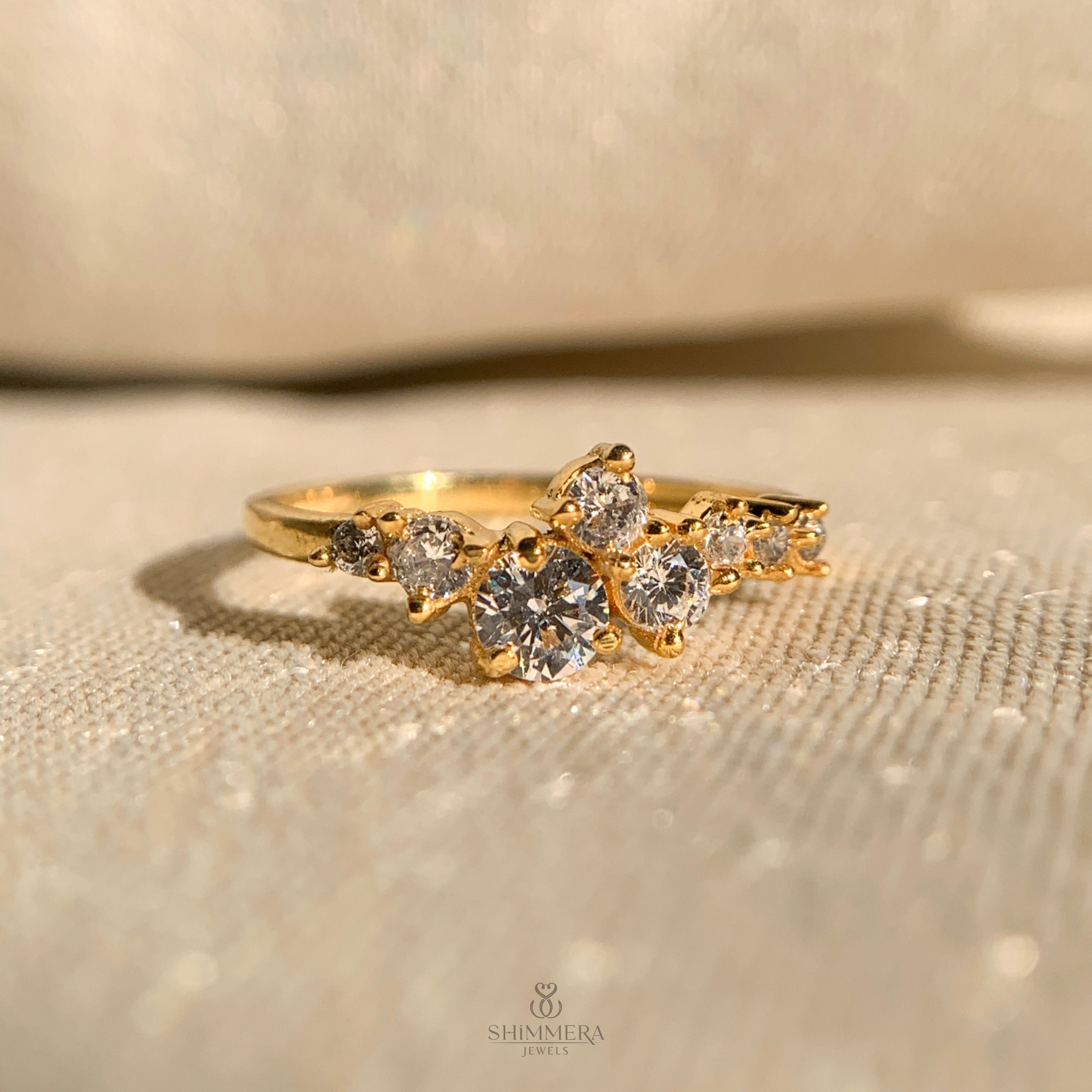 Moissanite diamond cluster ring in yellow gold with sparkling finish